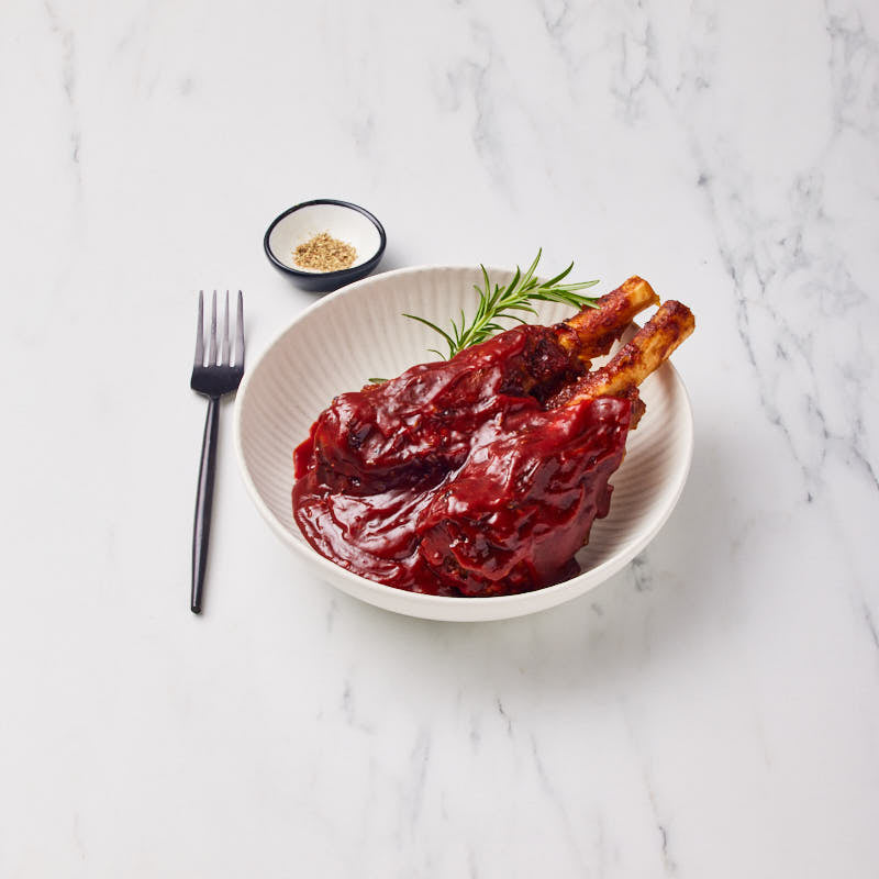 Slow Cooked Lamb Shanks in Red Wine Sauce – Peter Bouchier